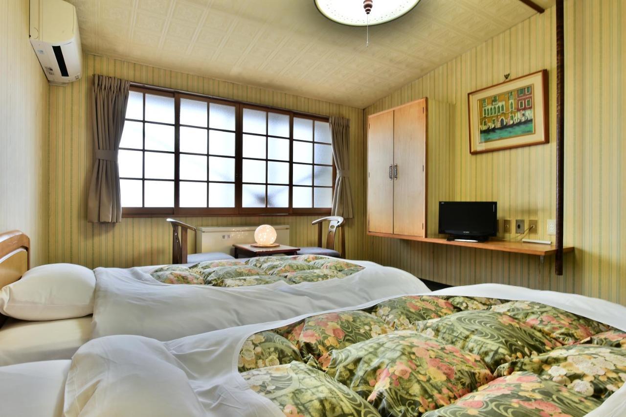 Takenoya Ryokan Омати Экстерьер фото